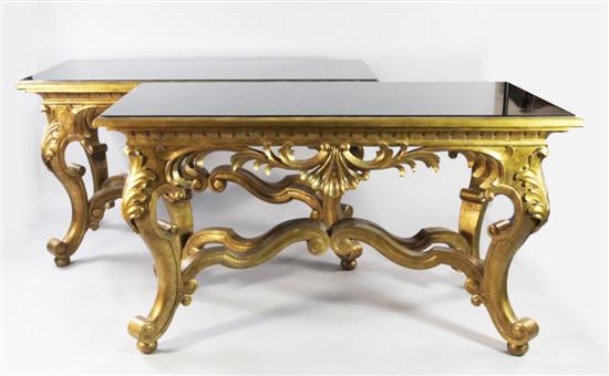 A pair of large Baroque revival carved giltwood console tables, by Christopher Guy, 5ft 4in. x 2ft 8.5in. x 3ft(-)
